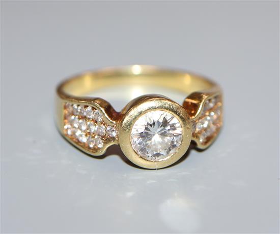 A diamond solitaire ring, the brilliant cut diamond approx 1.0ct with diamond-set shoulders, 18ct gold setting and shank, size O/P.